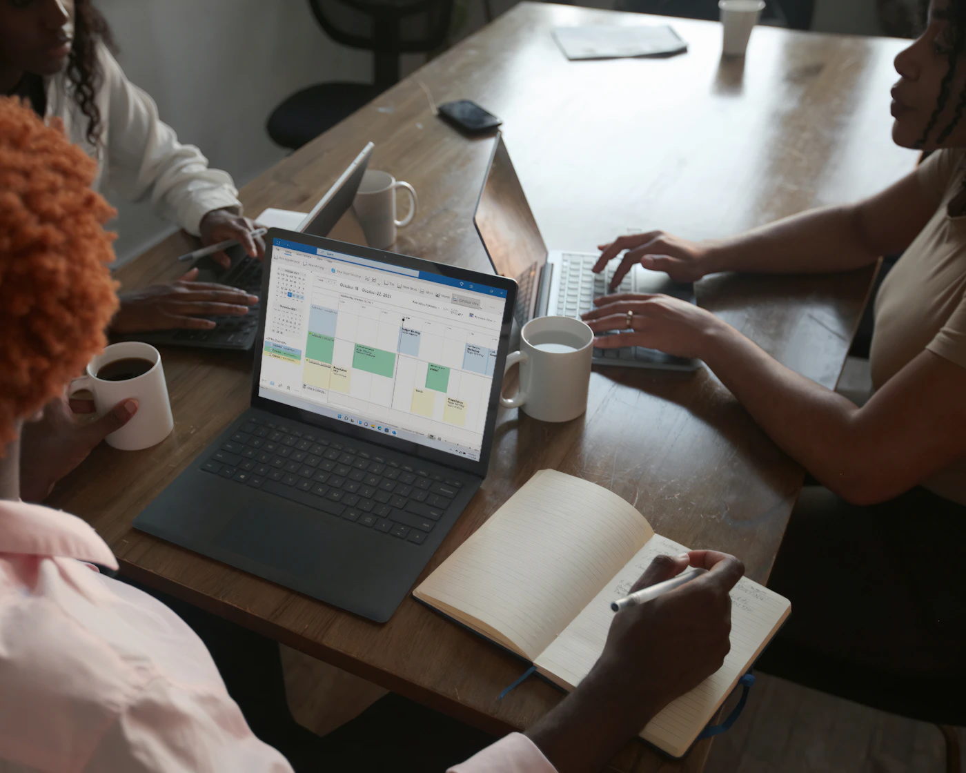 Professionals reviewing a plan together