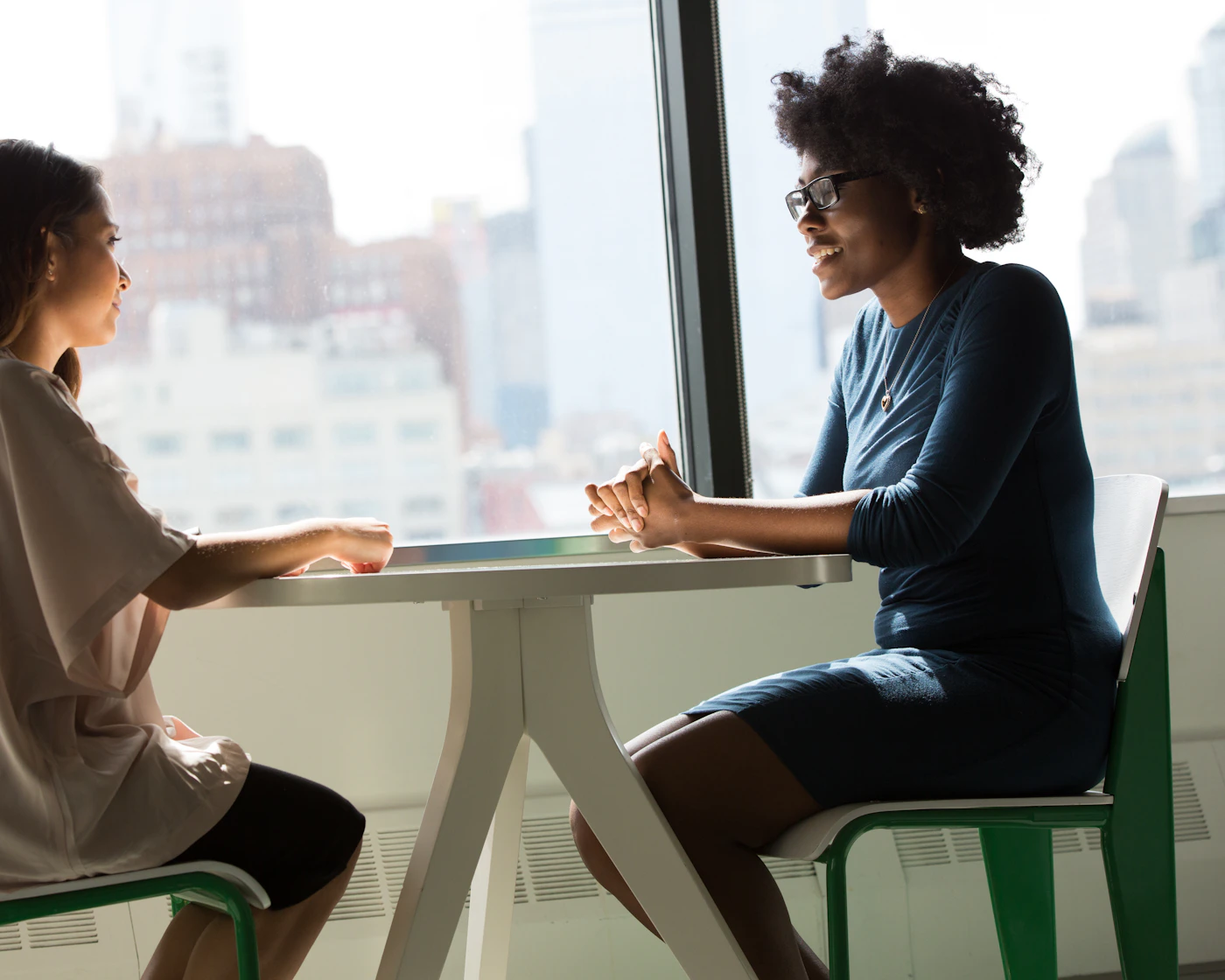 Two people having a thoughtful one-to-one conversation